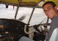 Daniel Adams piloting a  Russian AN-2 biplane in Venezuela