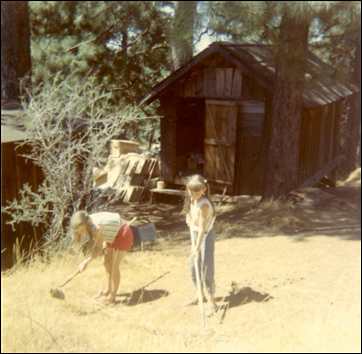 Linda & Lanita hoeing weeds at Ranch