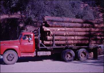 Celian Adams' loaded logging truck on Rock Creek Rd.