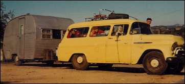 1957 Chevy and Love Bug trailer leaving for Mexico