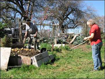 Celian & Betty Adams at compost pile