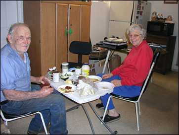 Celian & Betty Adams eating lunch in their Mosquito home