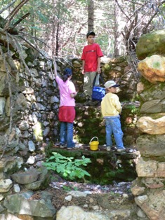 Mackenzie, Spencer and Cody climbing Deer View stonework