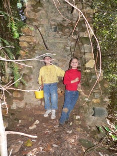 Cody and Alyssa in Deer View cabin fireplace chimney