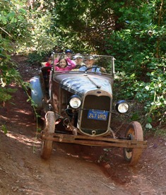 Homeschool kids in Ford Model A Roadster leaving Deer View