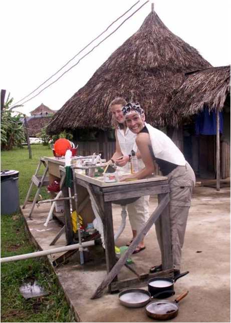 Corrie Sample with Susan Duehrssen washing her hair in Venezuela