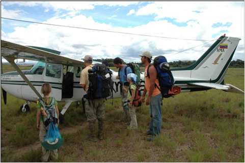 IRR medical team boarding mission plane after working in Caracol