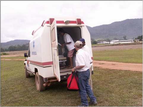 Patient being loaded into ambulance in Venezuela