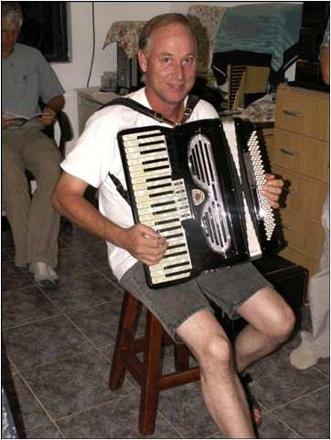 Bob Norton playing the accordian in Maurak, Venezuela