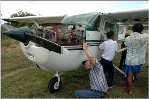 Bob Norton checks mission plane