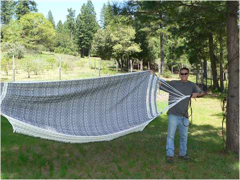 Daniel Adams displays a hammock he brought from Venezuela