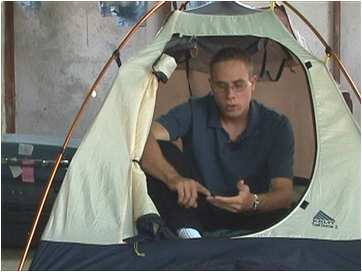 Daniel Adams in tent in Venezuela