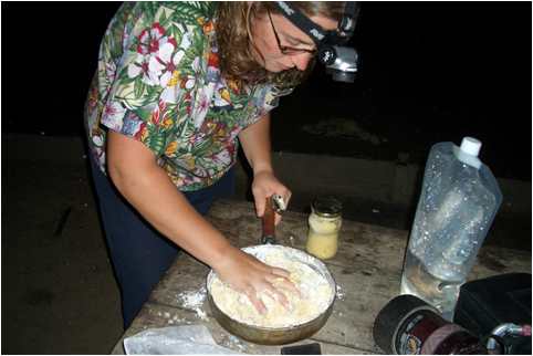 Corrie Sample prepares dough for Cowboy Biscuits in Venezuela