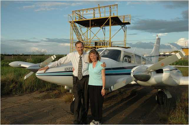 David & Becky Gates by their mission plane in Venezuela