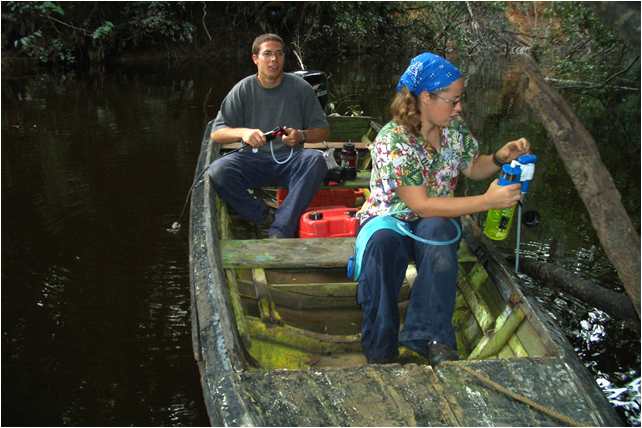 Daniel Adams and Corrie Sample filter Venezuela river water for drinking