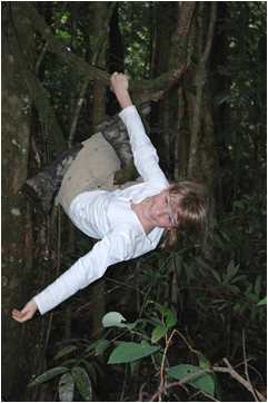 Adrianna Duehrssen plays monkey on a jungle vine in Venezuela