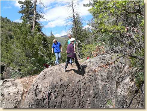 Diana Adams rappelling cliff for first time