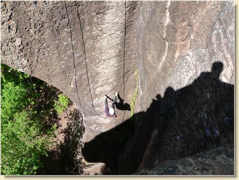 Diana Adams near bottom of rappelling cliff