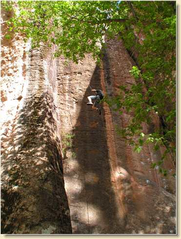 Daniel Adams leaping out while rappelling