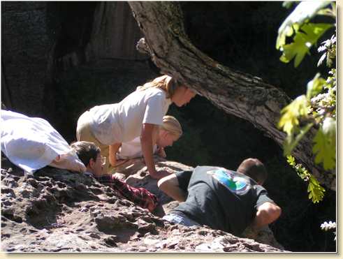 Fred, Lezli, Sarah & Daniel watch from the cliff ledge