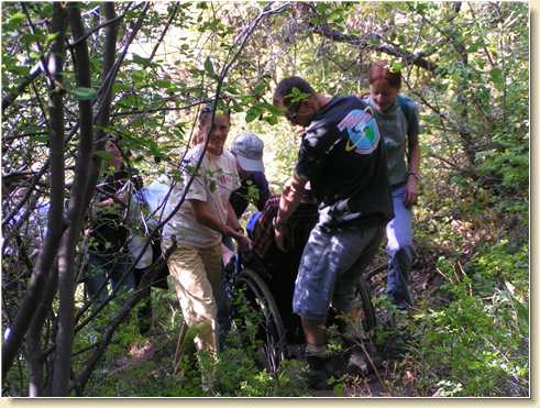 Daniel & crew pulling Fred Adams up the trail