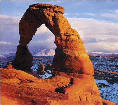 Delicate Arch with LaSal mountains in background