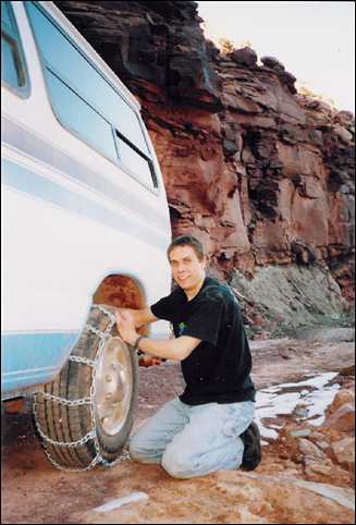 Daniel Adams chaining up on the Shaffer Trail