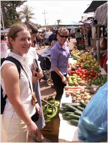 Corrie Sample and Becky Gates shopping for produce