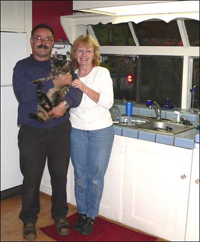 Chief Leo Chaloux with wife Chris and cat Tumbles