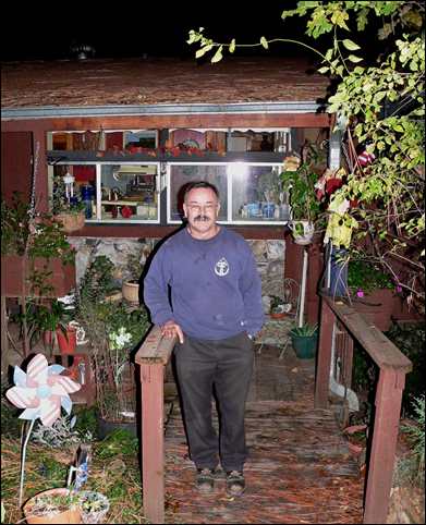 Chief Leo Chaloux outside his kitchen window