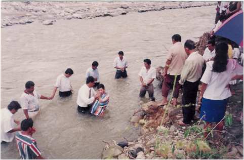 Baptism in Mexican river