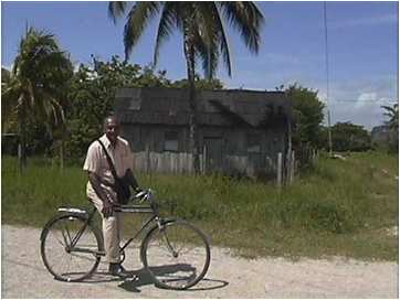 MPI layman Cirilo Suarez riding bicycle to give Bible studies in Chiapas, Mexico