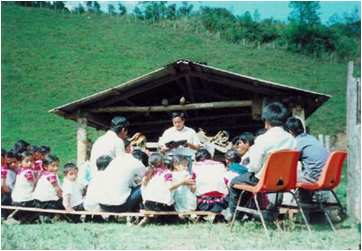 Adventist worshippers sitting outdoors